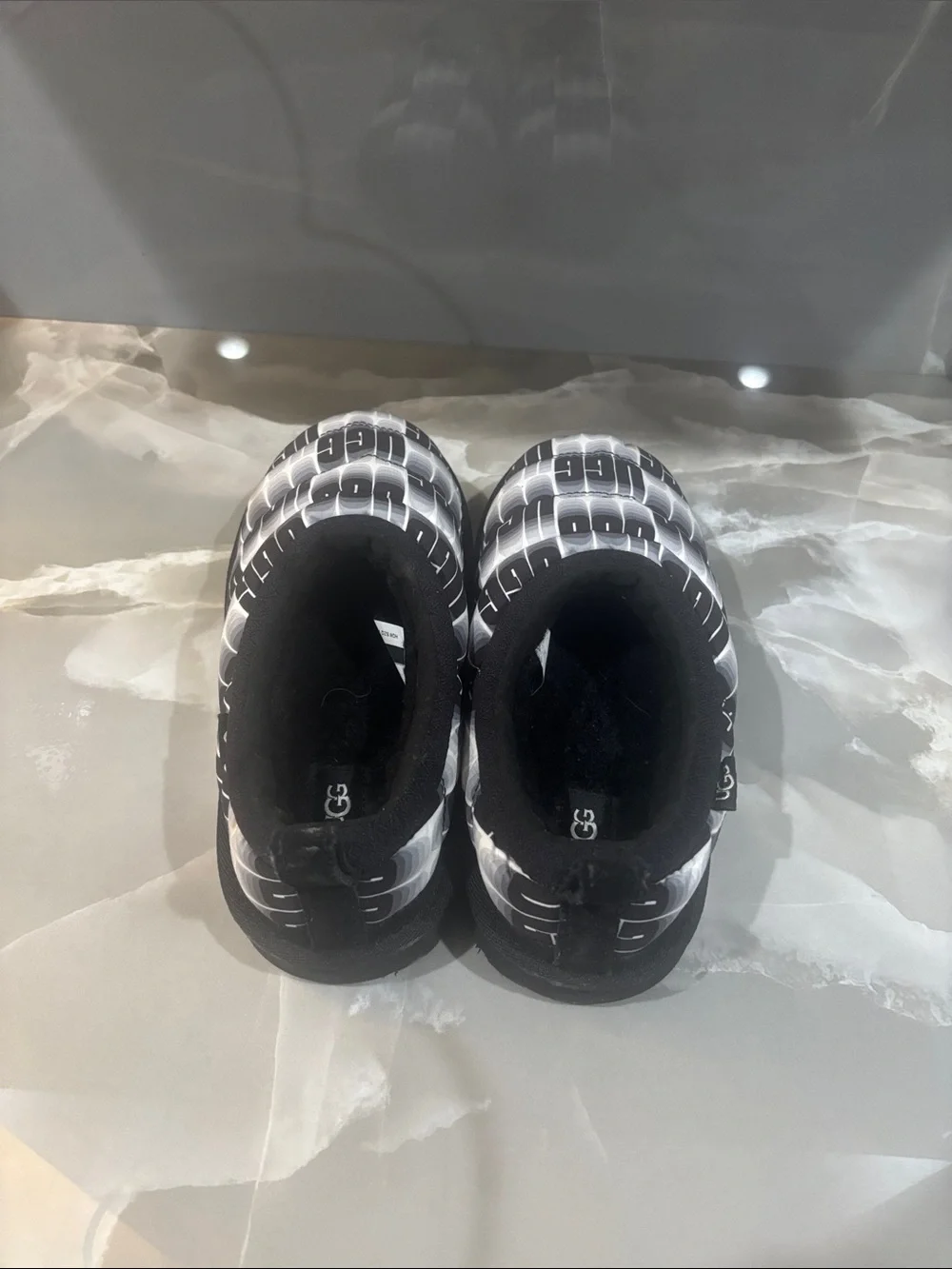 UGG Kids Black & White Logo Slip-On Puffer Shoes